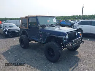 2006 Jeep Wrangler Sport z VIN 1J4FA49S66P708332, wystawiony jako IAAI lot #42402995 z przebiegiem 130 795 mil mil oraz . Historia ofert i sprzedaży dostępna na DreamBid. Obrazek 1.
