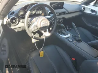 2024 Mazda MX-5 Miata Grand Touring z VIN JM1NDAM76R0602972, wystawiony jako Copart lot #77665904 z przebiegiem 4 965 mil mil oraz Szkoda całkowita • Salvage title. Historia ofert i sprzedaży dostępna na DreamBid. Obrazek 8.