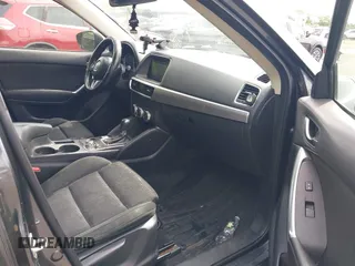 2016 Mazda CX-5 Touring z VIN JM3KE4CY4G0692655, wystawiony jako IAAI lot #42318657 z przebiegiem 212 826 mil mil oraz . Historia ofert i sprzedaży dostępna na DreamBid. Obrazek 5.