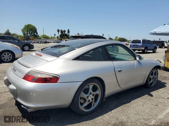 2003 Porsche 911 with VIN WP0BA29923S635457, listed as a Copart auction lot 61446545 with 85,602 mi miles and Salvage title. Bid and sale history available at DreamBid. Image 3.