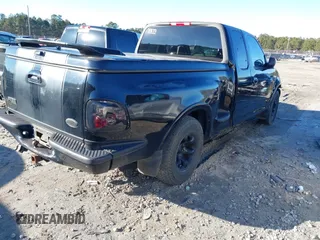 1999 Ford F-150 XL with VIN 1FTRX07L3XKC15874, listed as a IAAI auction lot 41363405 with Not Provided miles. Bid and sale history available at carsss.com. Image 4.