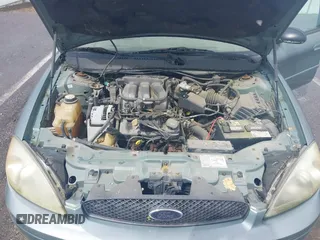 2005 Ford Taurus SE with VIN 1FAFP53U55A209369, listed as a IAAI auction lot 42144800 with 152,446 mi miles. Bid and sale history available at carsss.com. Image 10.