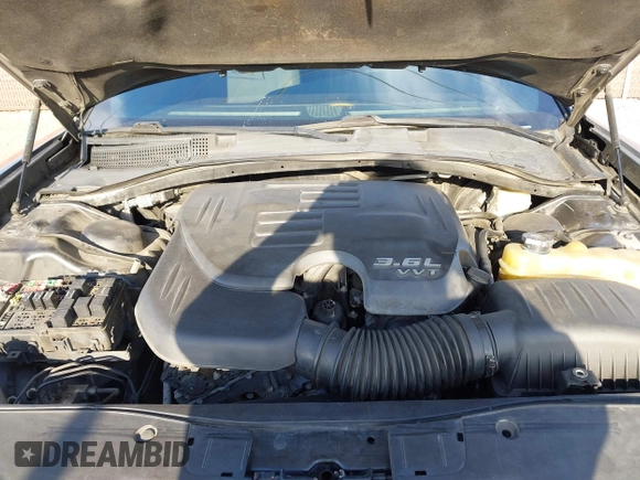 2015 Dodge Charger SXT with VIN 2C3CDXHG9FH915191, listed as a IAAI auction lot 41850427 with 164,535 mi miles and . Bid and sale history available at DreamBid. Image 10.