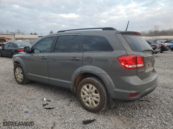 2019 Dodge Journey SE with VIN 3C4PDCBB2KT821254, listed as a Copart auction lot 43277285 with 85,639 mi miles and Salvage Title. Bid and sale history available at carsss.com. Image 2.