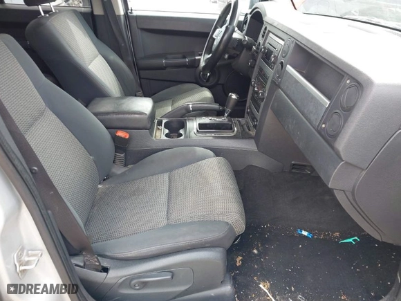 2010 Jeep Commander Sport with VIN 1J4RG4GK1AC158407, listed as a IAAI auction lot 41883678 with 206,949 mi miles. Bid and sale history available at carsss.com. Image 5.