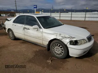 1998 Acura RL Premium z VIN JH4KA9657WC008762, wystawiony jako Copart lot #52979915 z przebiegiem 144 954 mil mil oraz Szkody całkowita. Historia ofert i sprzedaży dostępna na DreamBid. Obrazek 4.