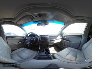2015 Toyota Camry Hybrid LE with VIN 4T1BD1FKXFU159875, listed as a IAAI auction lot 42041323 with 240,779 mi miles. Bid and sale history available at carsss.com. Image 20.