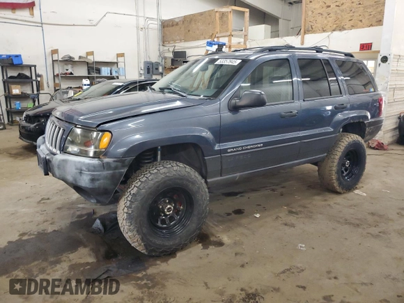 2004 Jeep Grand Cherokee Laredo with VIN 1J4GW48S24C294185, listed as a Copart auction lot 53357945 with 209,169 mi miles and Clean Title. Bid and sale history available at carsss.com. Image 1.