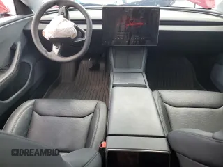 2025 Tesla Model 3 Long Range with VIN 5YJ3E1EA4SF897642, listed as a Copart auction lot 55498795 with 6,099 mi miles and Salvage title. Bid and sale history available at DreamBid. Image 8.