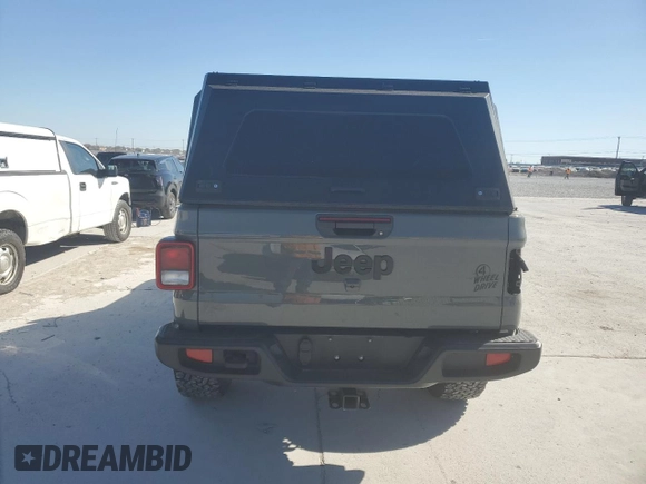 2022 Jeep Gladiator Texas Trail with VIN 1C6HJTAG8NL103449, listed as a Copart auction lot 49823595 with 60,902 mi miles and Salvage Title. Bid and sale history available at carsss.com. Image 6.