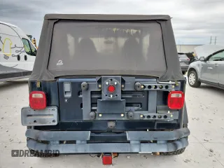 2000 Jeep Wrangler Sahara with VIN 1J4FA59S1YP777549, listed as a Copart auction lot 63622335 with 197,426 mi miles and Clean title. Bid and sale history available at DreamBid. Image 6.