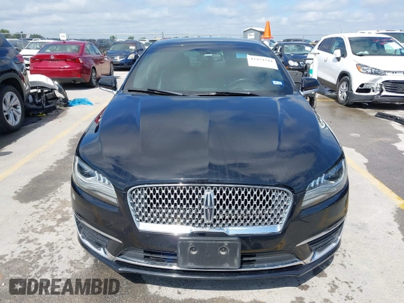 2017 Lincoln MKZ Premiere z VIN 3LN6L5A92HR628287, wystawiony jako IAAI lot #42474344 z przebiegiem 70 010 mil mil oraz . Historia ofert i sprzedaży dostępna na DreamBid. Obrazek 12.