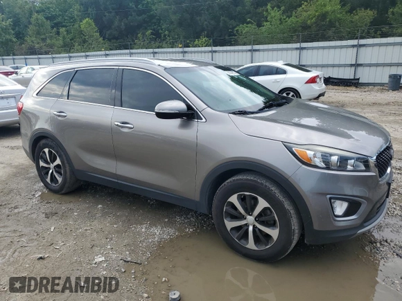 2017 Kia Sorento EX with VIN 5XYPH4A12HG291225, listed as a Copart auction lot 56944805 with 103,702 mi miles and Salvage title. Bid and sale history available at DreamBid. Image 4.
