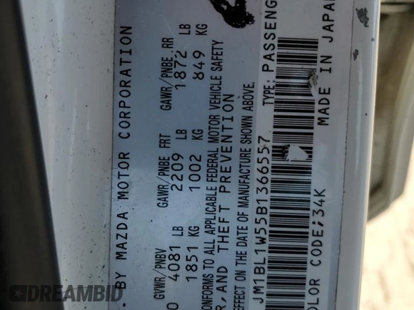 2011 Mazda 3 S Grand Touring z VIN JM1BL1W55B1366557, wystawiony jako Copart lot #52973745 z przebiegiem 133 278 mil mil oraz Szkoda całkowita • Salvage title. Historia ofert i sprzedaży dostępna na DreamBid. Obrazek 15.