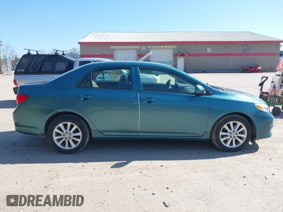 2009 Toyota Corolla with VIN JTDBL40E299037014, listed as a IAAI auction lot 42078954 with 86,559 mi miles. Bid and sale history available at carsss.com. Image 14.