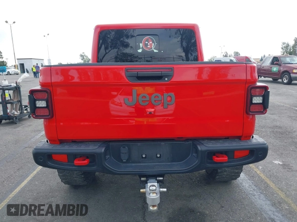 2021 Jeep Gladiator Rubicon with VIN 1C6JJTBGXML572976, listed as a IAAI auction lot 42134909 with 35,612 mi miles and . Bid and sale history available at DreamBid. Image 16.