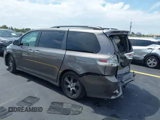 2015 Toyota Sienna SE with VIN 5TDXK3DC2FS552698, listed as a IAAI auction lot 42253119 with 110,710 mi miles and . Bid and sale history available at DreamBid. Image 3.