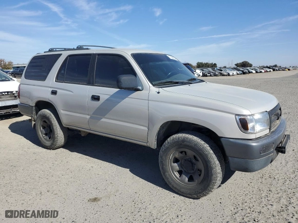1997 Toyota 4Runner with VIN JT3GM84R7V0009560, listed as a Copart auction lot 77699954 with 214,861 mi miles and Clean Title. Bid and sale history available at carsss.com. Image 4.