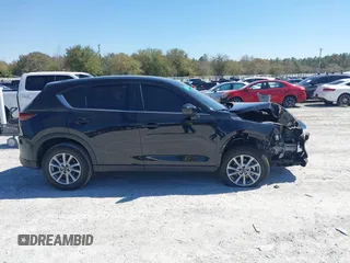 2023 Mazda CX-5 2.5 S with VIN JM3KFBAM3P0244974, listed as a IAAI auction lot 41748896 with 21,387 mi miles. Bid and sale history available at carsss.com. Image 13.