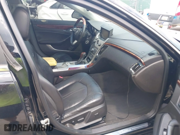 2011 Cadillac CTS Luxury with VIN 1G6DF5EY8B0100736, listed as a IAAI auction lot 42581059 with 107,237 mi miles and . Bid and sale history available at DreamBid. Image 5.