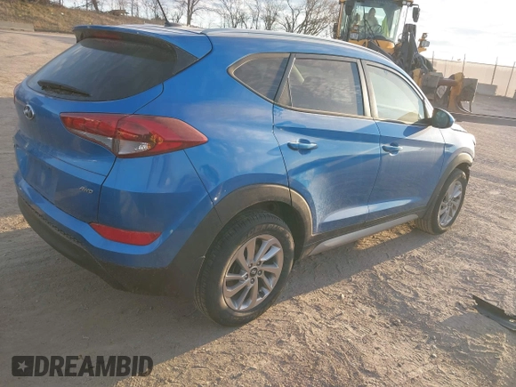 2017 Hyundai Tucson SE with VIN KM8J3CA49HU260735, listed as a IAAI auction lot 41869905 with 40,877 mi miles. Bid and sale history available at carsss.com. Image 4.