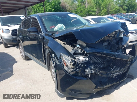 2019 Mazda CX-5 Grand Touring with VIN JM3KFBDM2K0564047, listed as a IAAI auction lot 42000455 with 152,590 mi miles and . Bid and sale history available at carsss.com. Image 1.
