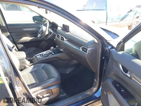 2019 Mazda CX-5 Grand Touring with VIN JM3KFBDM2K1685168, listed as a IAAI auction lot 41323598 with 88,429 mi miles. Bid and sale history available at carsss.com. Image 5.
