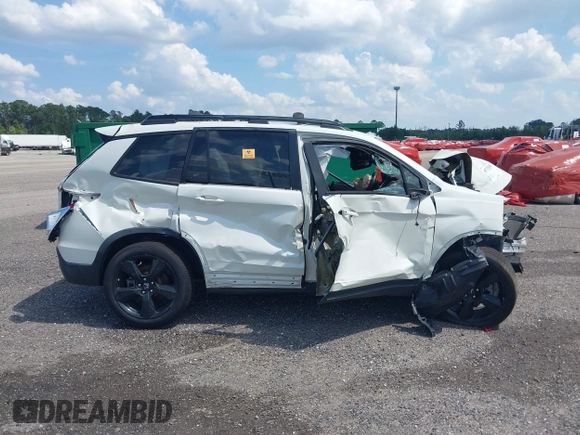 2019 Honda Passport Touring z VIN 5FNYF7H91KB001286, wystawiony jako IAAI lot #41733668 z przebiegiem Nie podano mil oraz . Historia ofert i sprzedaży dostępna na DreamBid. Obrazek 13.