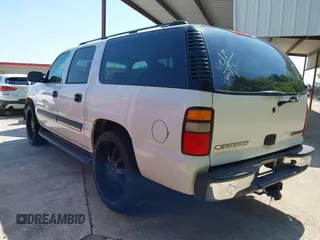 2004 Chevrolet Suburban LT with VIN 3GNEC16T04G341718, listed as a IAAI auction lot 41960398 with 228,523 mi miles. Bid and sale history available at carsss.com. Image 3.