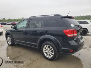 2015 Dodge Journey SXT with VIN 3C4PDDBG0FT660457, listed as a Copart auction lot 54582265 with 164,879 mi miles and Salvage title. Bid and sale history available at DreamBid. Image 2.