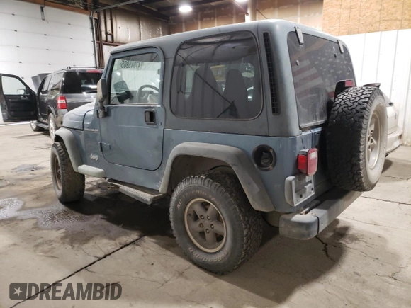 1999 Jeep Wrangler SE with VIN 1J4FY29P0XP412753, listed as a Copart auction lot 47015985 with 137,388 mi miles and Salvage Title. Bid and sale history available at carsss.com. Image 2.