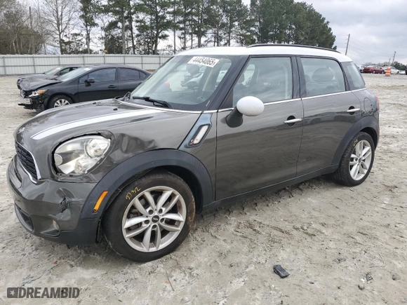 2014 MINI Cooper Countryman S with VIN WMWZC3C53EWT00673, listed as a Copart auction lot 44454065 with 76,561 mi miles and Salvage Title. Bid and sale history available at carsss.com. Image 1.