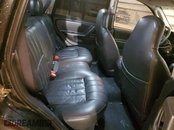 2003 Jeep Grand Cherokee Laredo with VIN 1J4GX48S13C601387, listed as a Copart auction lot 60544295 with 217,485 mi miles and Salvage title. Bid and sale history available at DreamBid. Image 11.