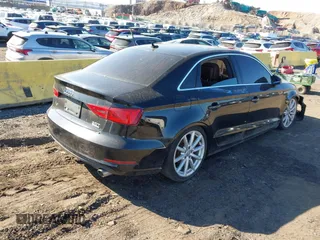 2016 Audi A3 Premium Plus z VIN WAUE8GFF4G1021048, wystawiony jako IAAI lot #41632960 z przebiegiem 107 911 mil mil oraz . Historia ofert i sprzedaży dostępna na DreamBid. Obrazek 4.