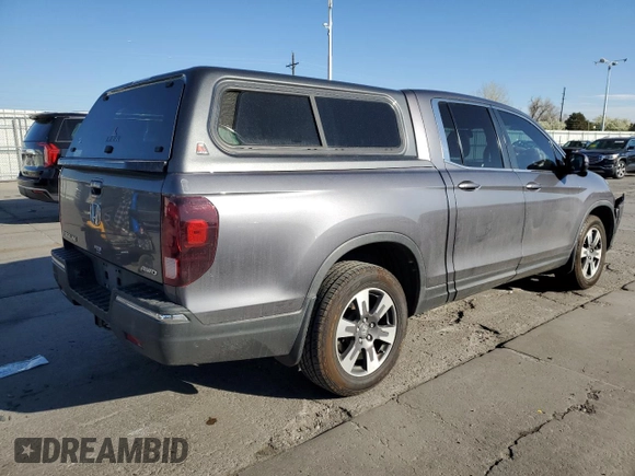 2019 Honda Ridgeline RTL-T with VIN 5FPYK3F67KB027637, listed as a Copart auction lot 53324325 with 70,801 mi miles and Salvage title. Bid and sale history available at DreamBid. Image 3.