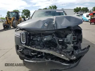 2023 Rivian R1S Adventure z VIN 7PDSGABA5PN010593, wystawiony jako Copart lot #52508835 z przebiegiem 16 962 mil mil oraz Szkody całkowita. Historia ofert i sprzedaży dostępna na DreamBid. Obrazek 5.