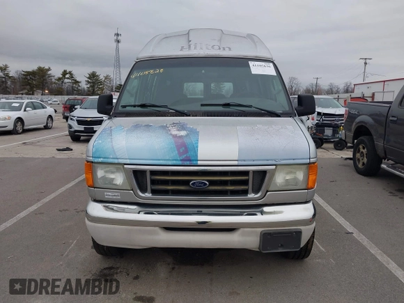 2006 Ford Econoline Cargo with VIN 1FTNS24W66DB32773, listed as a IAAI auction lot 41105626 with 219,787 mi miles. Bid and sale history available at carsss.com. Image 6.