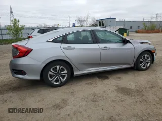 2017 Honda Civic LX z VIN 2HGFC2F51HH011825, wystawiony jako Copart lot #56276965 z przebiegiem 136 266 mil mil oraz Szkoda całkowita • Salvage title. Historia ofert i sprzedaży dostępna na DreamBid. Obrazek 3.
