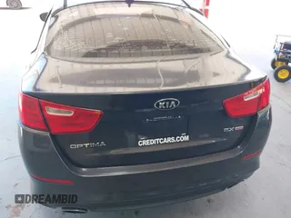 2015 Kia Optima EX z VIN 5XXGN4A7XFG497858, wystawiony jako IAAI lot #42156724 z przebiegiem 109 028 mil mil oraz . Historia ofert i sprzedaży dostępna na DreamBid. Obrazek 16.