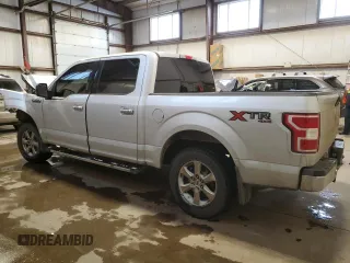 2019 Ford F-150 XL with VIN 1FTEW1EB4KKE25698, listed as a Copart auction lot 86572094 with 211,190 mi miles and Salvage Title. Bid and sale history available at carsss.com. Image 2.