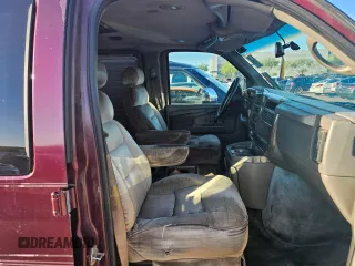 2004 Chevrolet Express Passenger z VIN 1GBFG15T141225336, wystawiony jako Copart lot #79581294 z przebiegiem Nie podano mil oraz Czysty tytuł • Clean title. Historia ofert i sprzedaży dostępna na DreamBid. Obrazek 5.