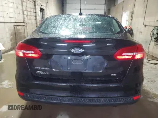 2017 Ford Focus SE with VIN 1FADP3F23HL244667, listed as a Copart auction lot 57597125 with 166,730 mi miles and Salvage title. Bid and sale history available at DreamBid. Image 6.