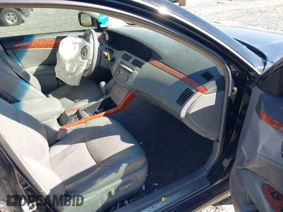 2005 Toyota Avalon XL with VIN 4T1BK36B25U012191, listed as a IAAI auction lot 38785162 with 230,071 mi miles and . Bid and sale history available at carsss.com. Image 5.