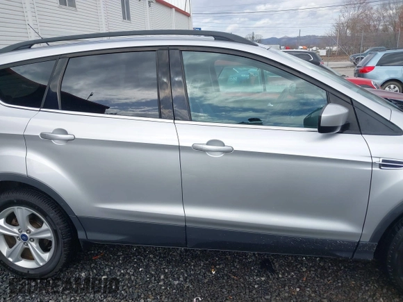 2014 Ford Escape SE with VIN 1FMCU9GX3EUD05447, listed as a IAAI auction lot 41817513 with 155,101 mi miles. Bid and sale history available at carsss.com. Image 13.