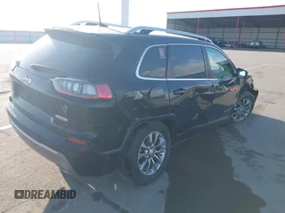 2019 Jeep Cherokee Latitude Plus with VIN 1C4PJMLX4KD305945, listed as a IAAI auction lot 41897473 with 53,271 mi miles. Bid and sale history available at carsss.com. Image 4.