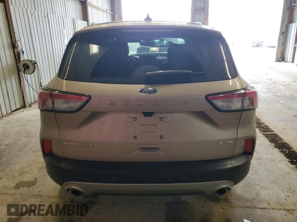 2021 Ford Escape Titanium with VIN 1FMCU9J90MUB15582, listed as a Copart auction lot 50982955 with 27,041 mi miles and Salvage Title. Bid and sale history available at carsss.com. Image 6.