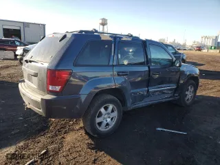 2010 Jeep Grand Cherokee Laredo with VIN 1J4PR4GK2AC125000, listed as a Copart auction lot 45710345 with 121,202 mi miles and Salvage Title. Bid and sale history available at carsss.com. Image 3.