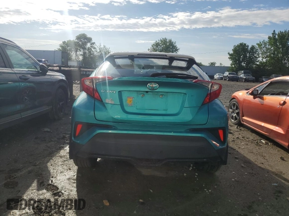 2018 Toyota C-HR XLE with VIN NMTKHMBX2JR041827, listed as a Copart auction lot 50443105 with 135,667 mi miles and Salvage title. Bid and sale history available at DreamBid. Image 6.