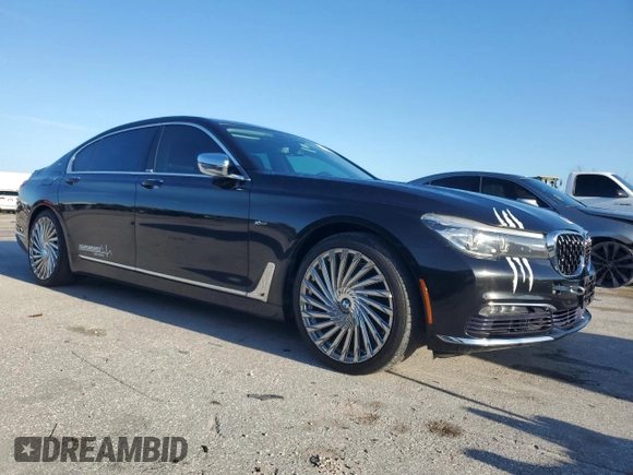 2017 BMW 7 Series 740i xDrive with VIN WBA7E4C34HGU99964, listed as a Copart auction lot 69808464 with 93,423 mi miles and Non Repairable. Bid and sale history available at carsss.com. Image 4.