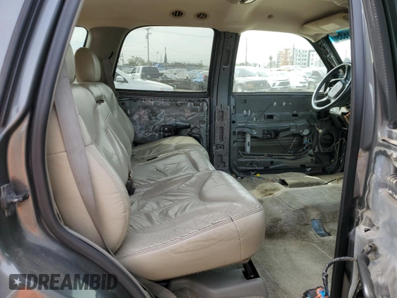 2002 GMC Yukon SLT z VIN 1GKEC13TX2R241172, wystawiony jako Copart lot #47281635 z przebiegiem Nie podano mil oraz Szkoda całkowita • Salvage title. Historia ofert i sprzedaży dostępna na DreamBid. Obrazek 11.